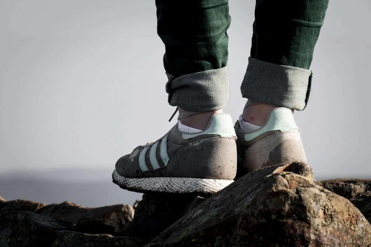 person standing on rock
