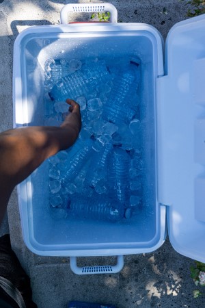 cooler full of ice and bottled water