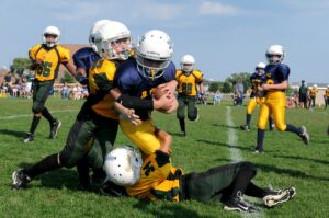 kids playing football